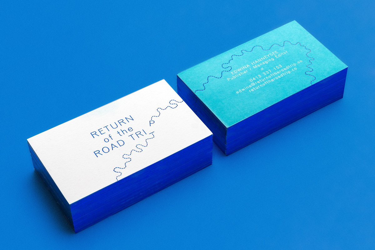 Return Of The Roadtrip business cards with cobalt foiling and edge gilding.